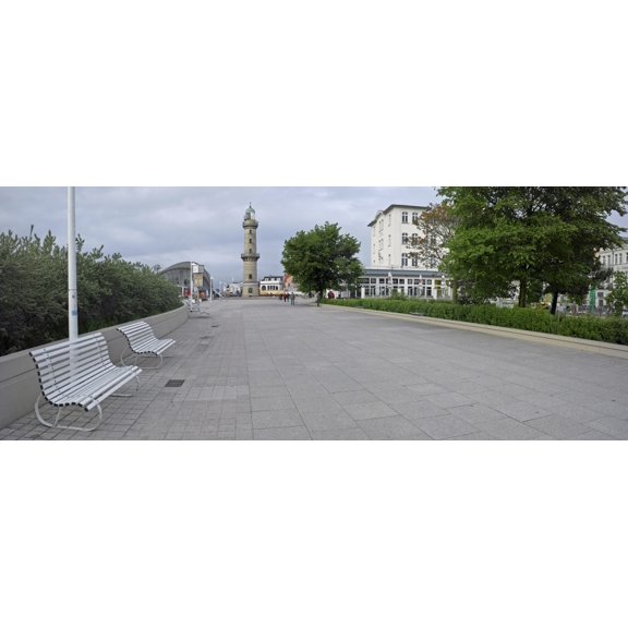 Promenade with lighthouse in the background Warnemunde Rostock Germany Canvas Art - Panoramic Images (27 x 9)