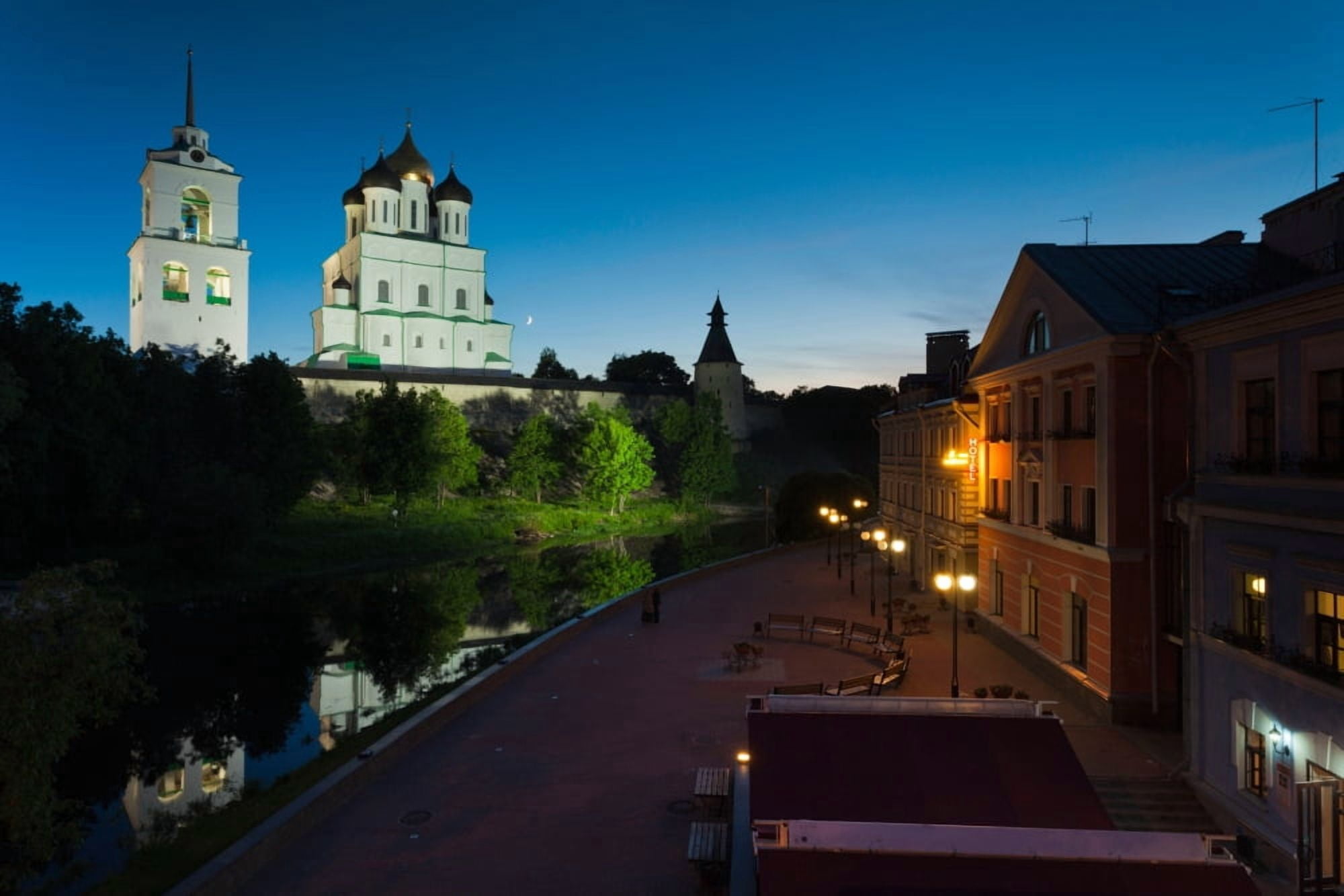 Pskov Kremlin and Trinity Cathedral reflected in Pskova River at dusk Pskov Pskovskaya Oblast Russia Canvas Art - Panoramic Images (27 x 9)