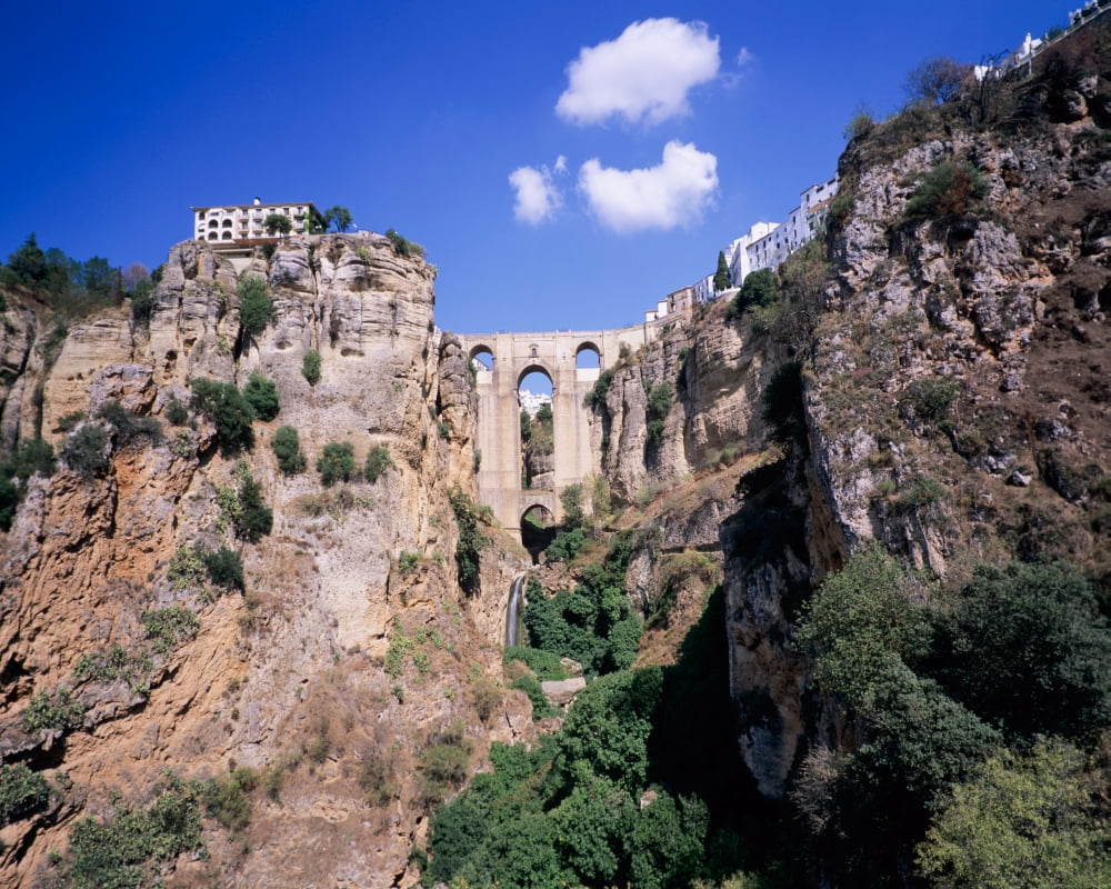 Puente Nuevo bridge above the gorge of the Guadalevin River Ronda Malaga Province Andalusia Spain Canvas Art - Panoramic Images (29 x 36)