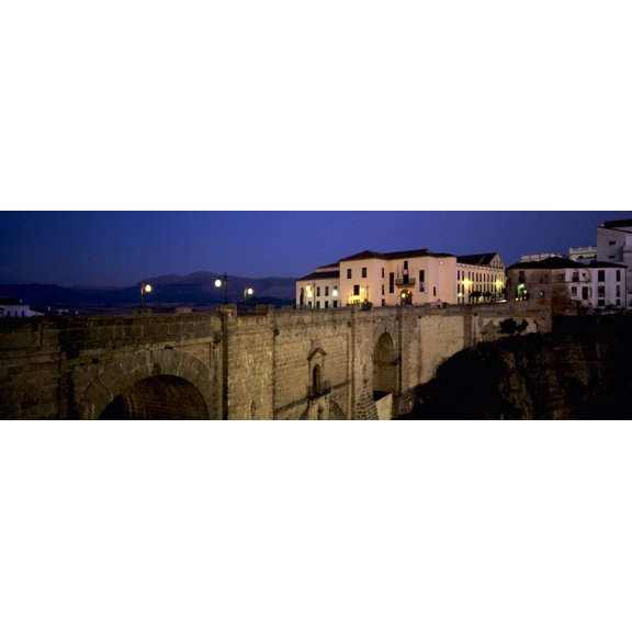 Puente Nuevo bridge above the gorge of the Guadalevin River Ronda Malaga Province Andalusia Spain Canvas Art - Panoramic Images (36 x 12)