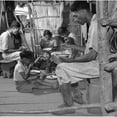 thumbnail image 1 of Puerto Rican Family Eating Their Main Meal Rice History (36 x 24), 1 of 2