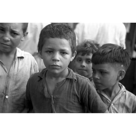 Puerto Rico Beggars 1942. Nchildren Begging For Pennies At The Market In Rio Piedras Puerto Rico. Photograph By Jack