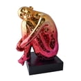 thumbnail image 1 of Puzzle Patterned Cradled Woman Resin Statue on Black Base Size: 13" x 12" x 19"H, 1 of 10