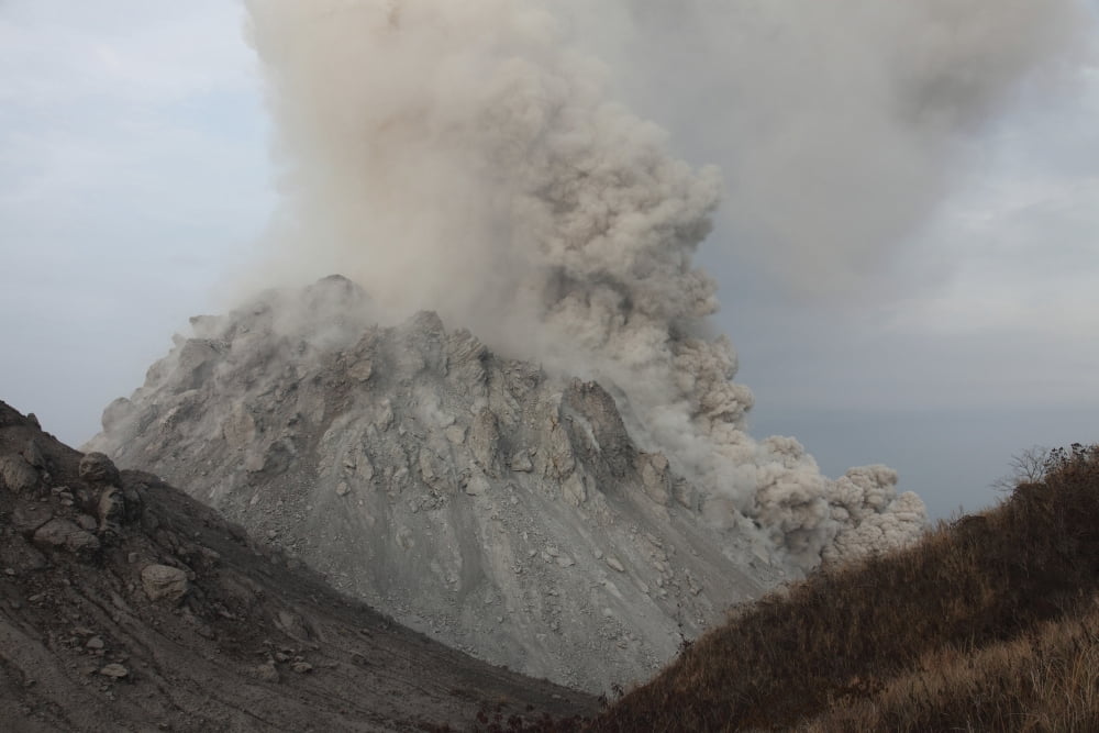 Pyroclastic flow descending flank of Rerombola lava dome of Paluweh volcano Canvas Art - Richard RoscoeStocktrek Images (35 x 23)