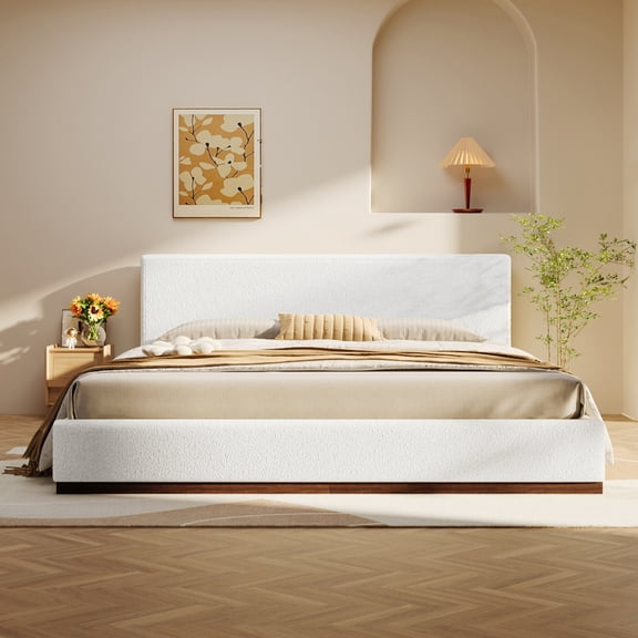 Queen size elegant white fabric upholstered bed with brown solid wood base frame, wood grain textured finish. Modern platform bed for bedroom