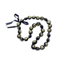 thumbnail image 1 of R.H. Jewelry Kukui Nut Leis Black with Gold Flower, 1 of 2