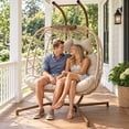 thumbnail image 1 of RADIATA Double Hanging Egg Chair with Stand and 5" Cushions, 2-Person Wicker Swing Chair, 690 lb Weight Capacity, Indoor Outdoor Patio Loveseat, Beige, 1 of 11