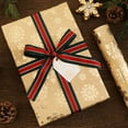 thumbnail image 1 of RXIRUCGD Gold Foil Christmas Wrapping Paper with Santa and Snowflake Patterns for Holiday Gift Presentation, Recyclable Kraft Paper for Festive Packaging, 1 of 6