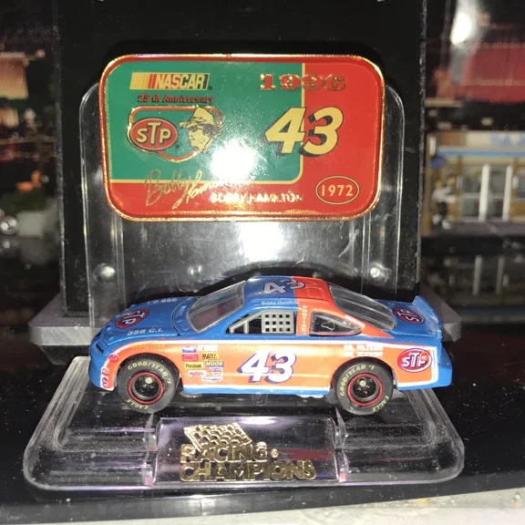Racing Champions STP #43 Bobby Hamilton 1:64 w/Collector Banner Stand RR Tire