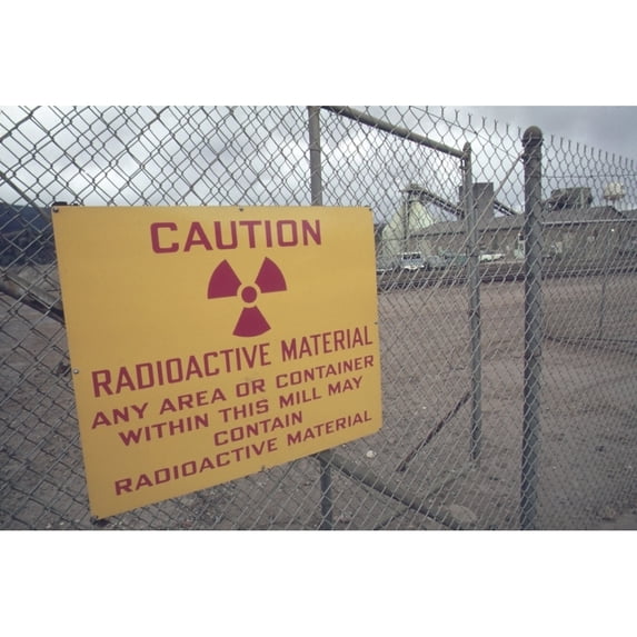 Radiation Warning Sign At A Union Carbide Uranium Mill Near Rifle Colorado. Many Former Workers Have Ongoing Health