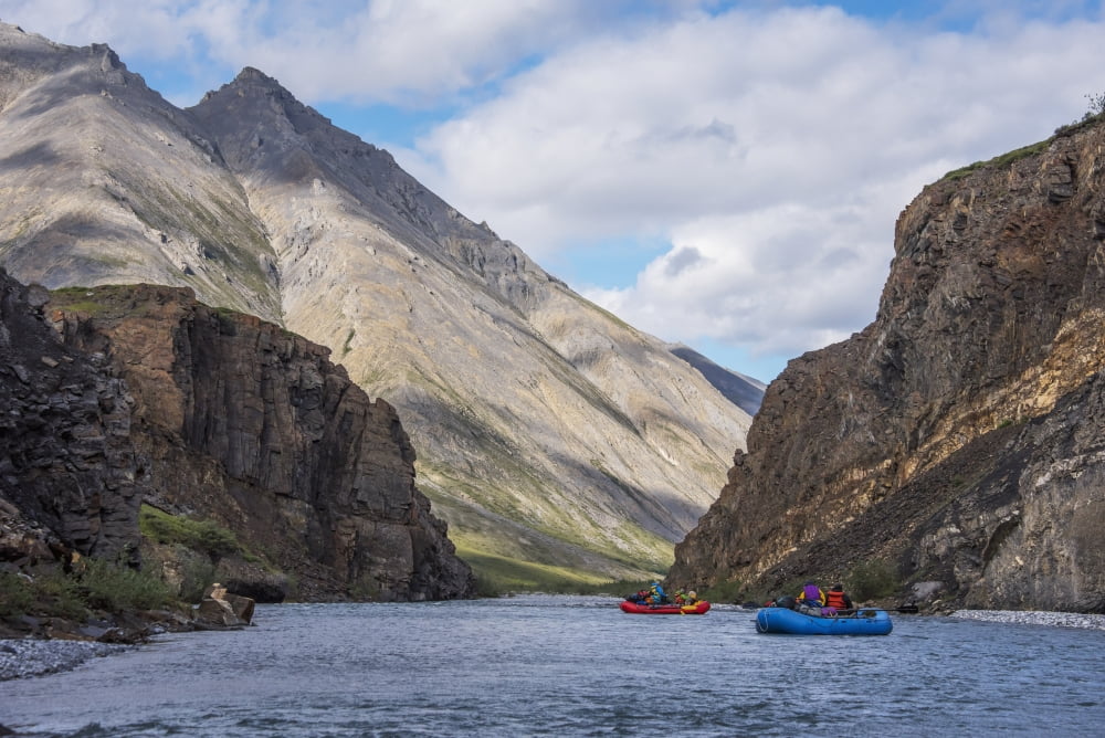 Rafters among canyon walls on the Marsh Fork of the Canning River in the Arctic National Wildlife Refuge Summer Alaska Canvas Art - Cathy Hart Design Pics (19 x 12)