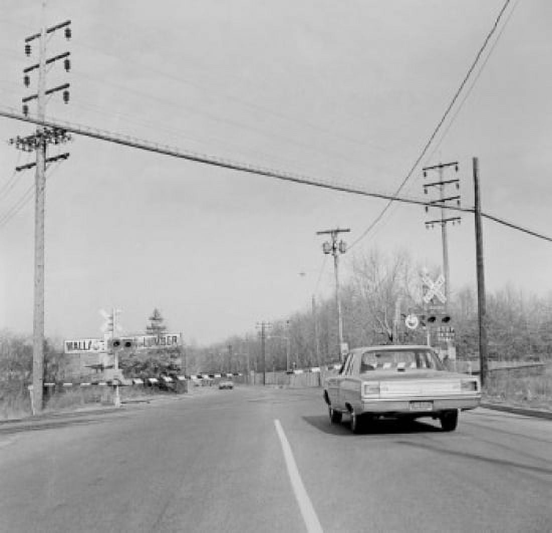 Railroad crossing gate in stop position Canvas Art - (24 x 36)