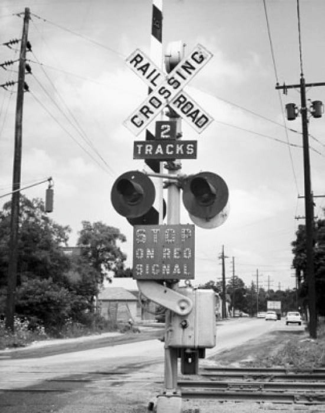 Railroad crossing sign at a railroad track Canvas Art - (18 x 24)