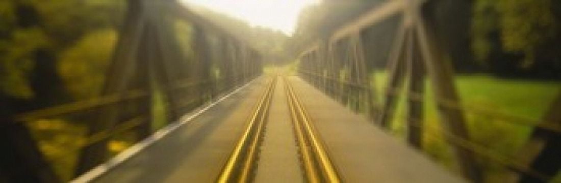Railroad tracks passing through a bridge Germany Canvas Art - Panoramic Images (18 x 6)