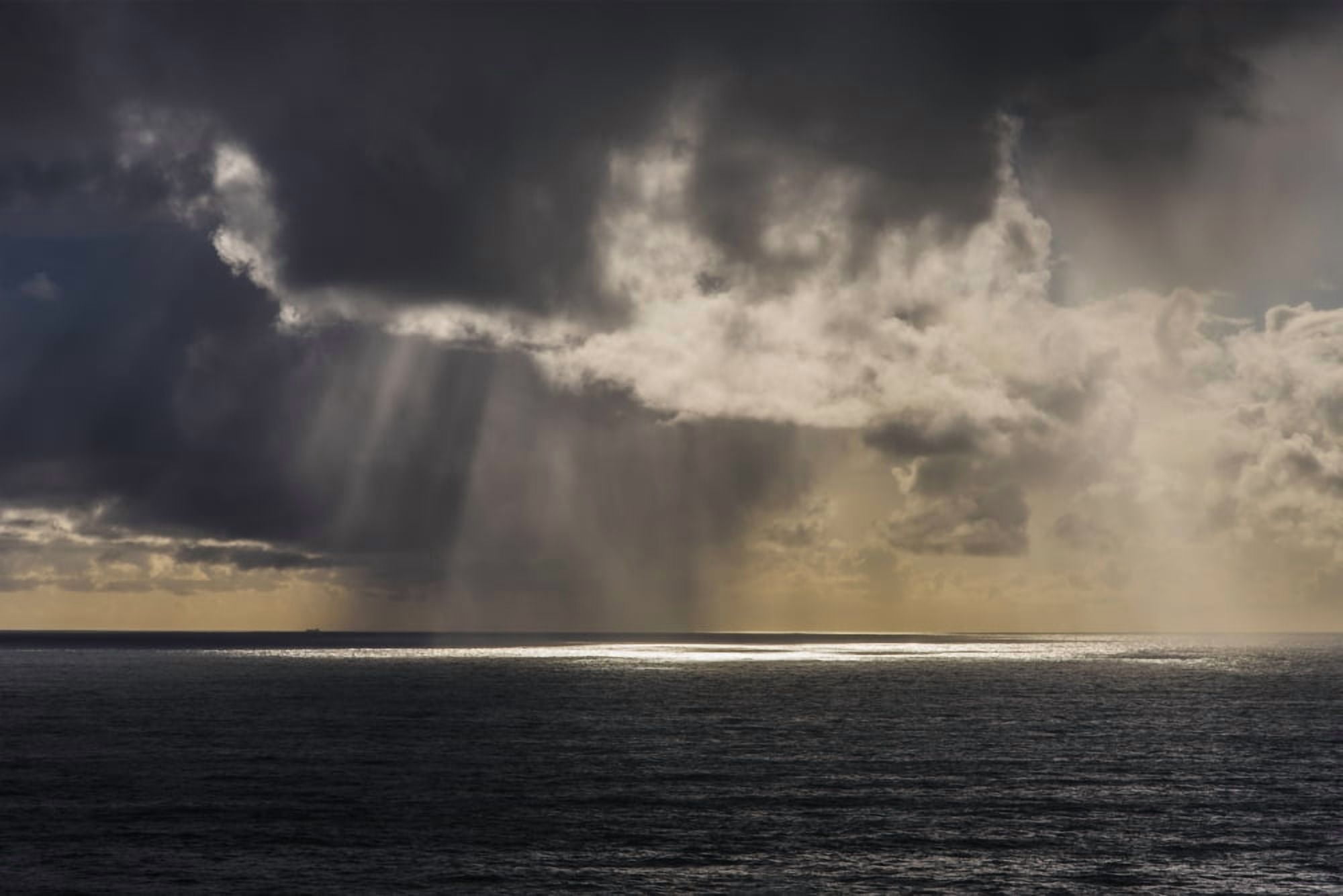 Rain falls in the distance off the coast Oregon United States of America Canvas Art - Robert L Potts Design Pics (19 x 12)