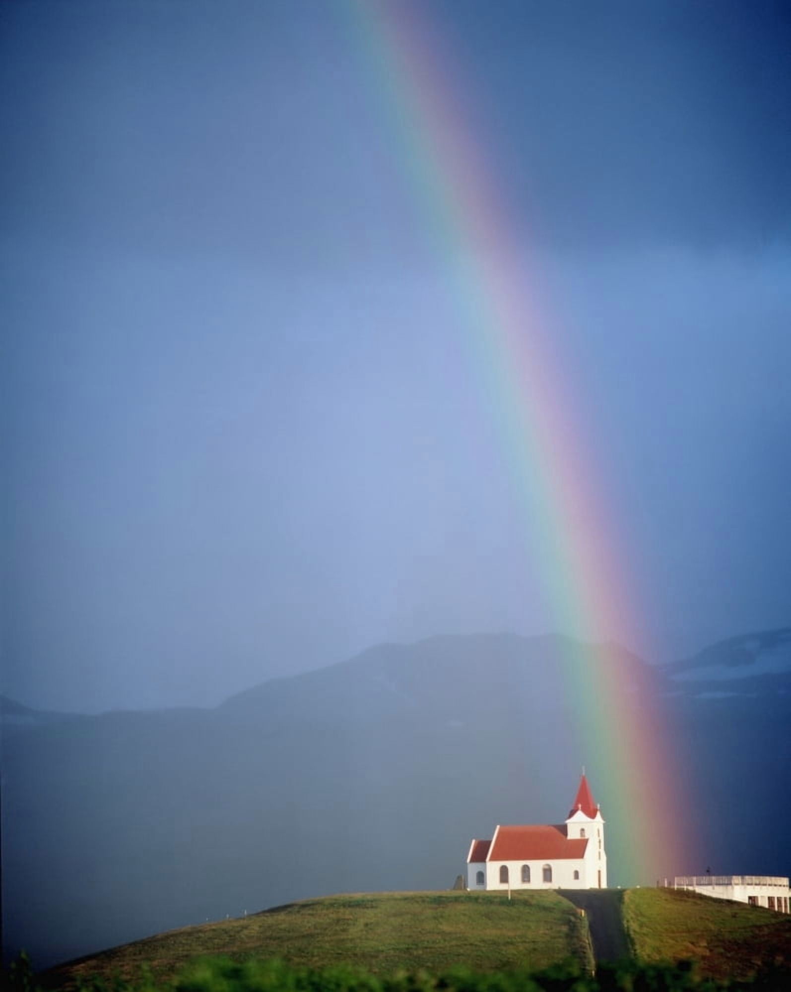 Rainbow Over Church And Snaefellsness Canvas Art - Joe Beynon Design Pics (24 x 30)