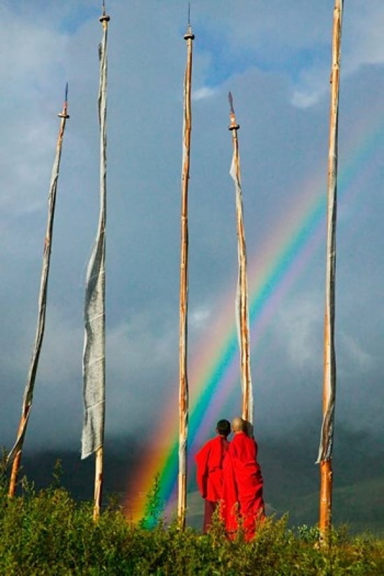 Rainbow and Monks with Praying Flags Phobjikha Valley Gangtey Village Bhutan Canvas Art - Keren Su DanitaDelimont (11 x 17)