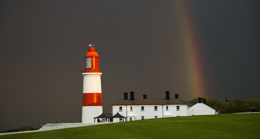 Rainbow and a red and white lighthouse South Shields Tyne and Wear England Canvas Art - John Short Design Pics (21 x 11)