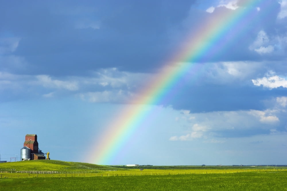 Rainbow in the sky beside a grain elevatorSaskatchewan canada Canvas Art - Jacques Laurent Design Pics (38 x 24)