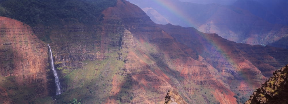 Rainbow over a canyon Waimea Canyon Waipoo Falls Kauai Hawaii USA Canvas Art - Panoramic Images (36 x 12)