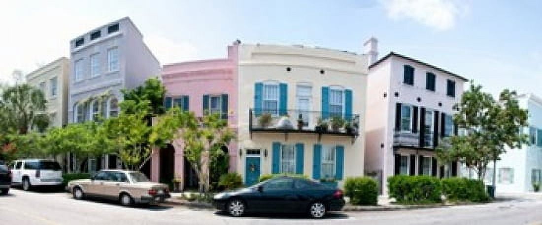 Rainbow row colorful houses along a street East Bay Street Charleston South Carolina USA Canvas Art - Panoramic Images (15 x 6)
