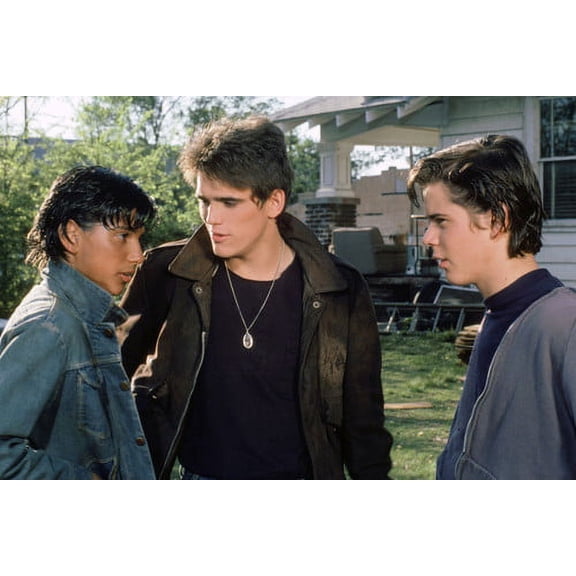 Ralph Macchio and Matt Dillon and C. Thomas Howell in The Outsiders in yard 24x36 Poster
