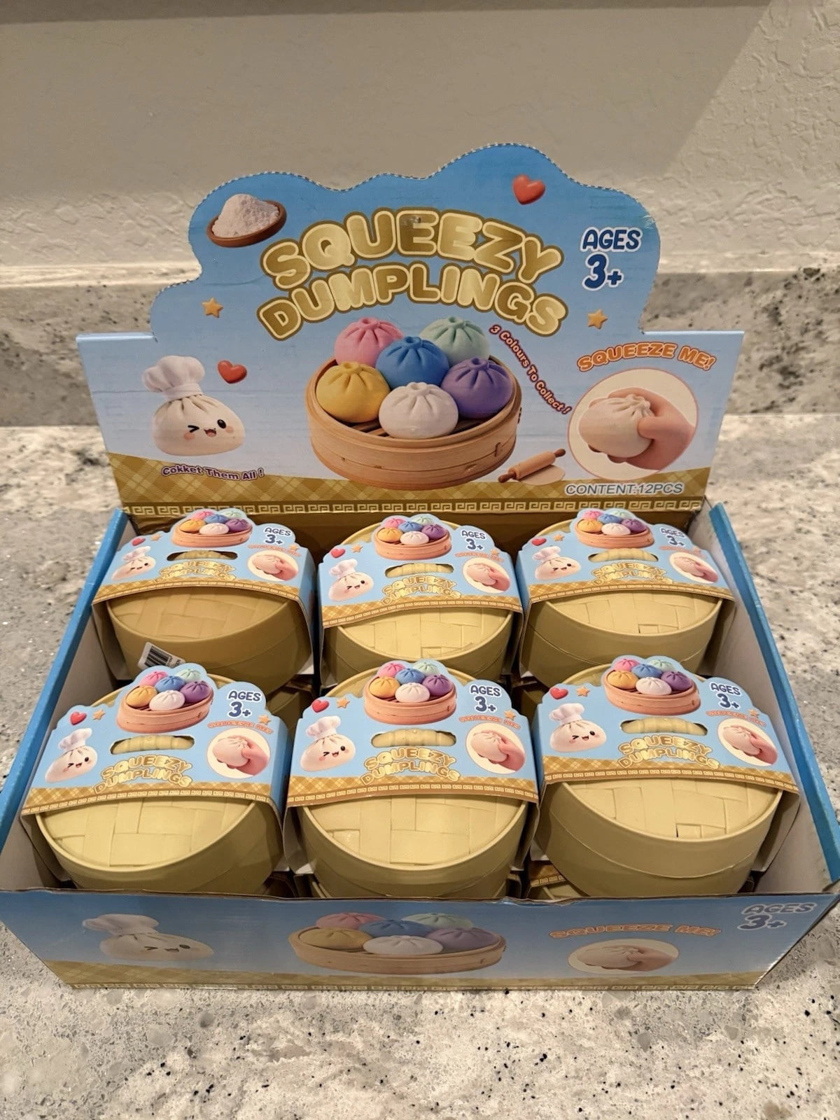 Rapidmart 1 Piece Color Reveal Dumpling Squishy Toy in Mini Container