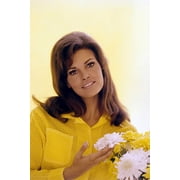 Raquel Welch yellow top by flowers 1960s 24x36 Poster