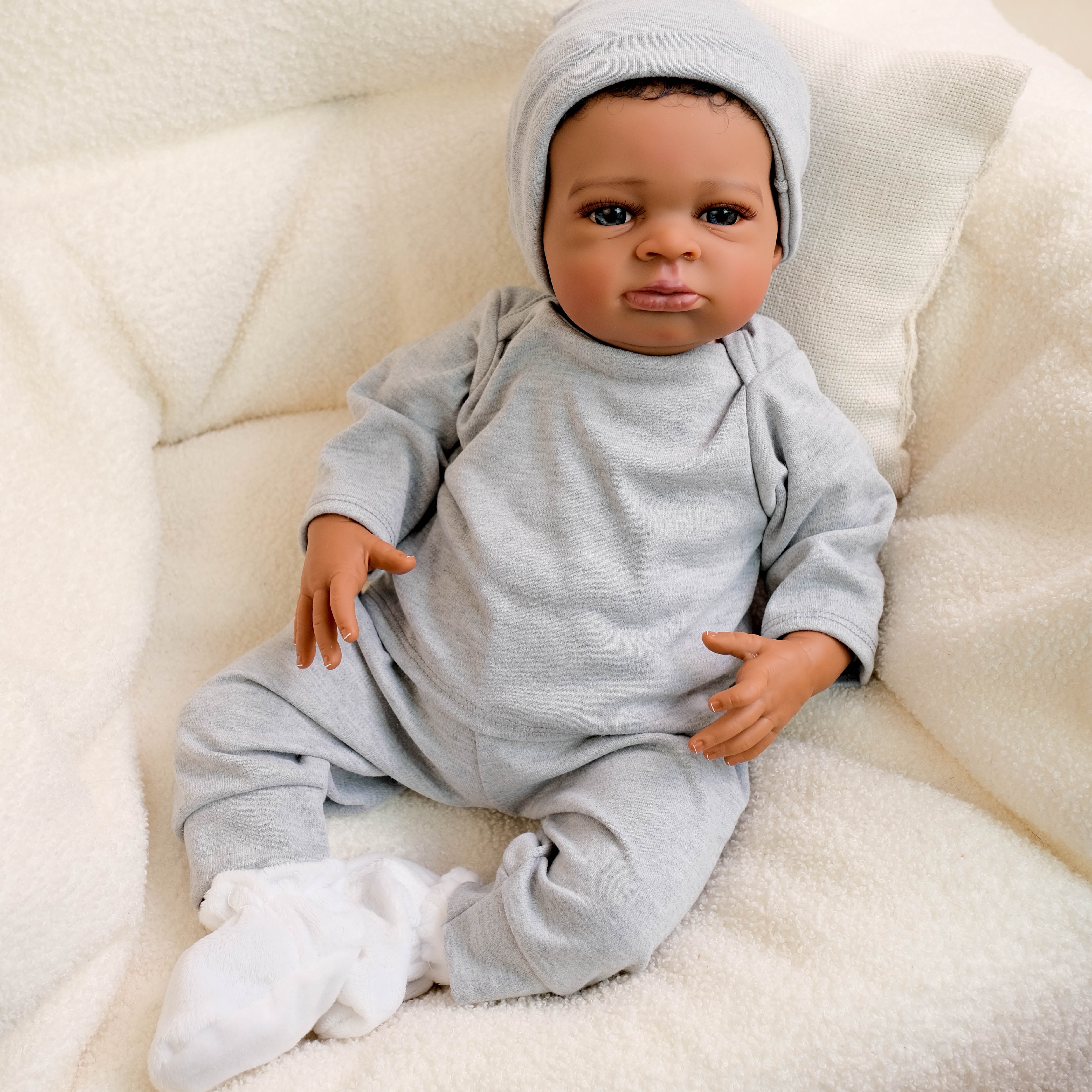 Realistic Reborn Baby Dolls 20" Lifelike Newborn Doll Cloth Body African American Real Life Baby Dolls Poseable Limbs and Feeding Toy for Kids Age 3+