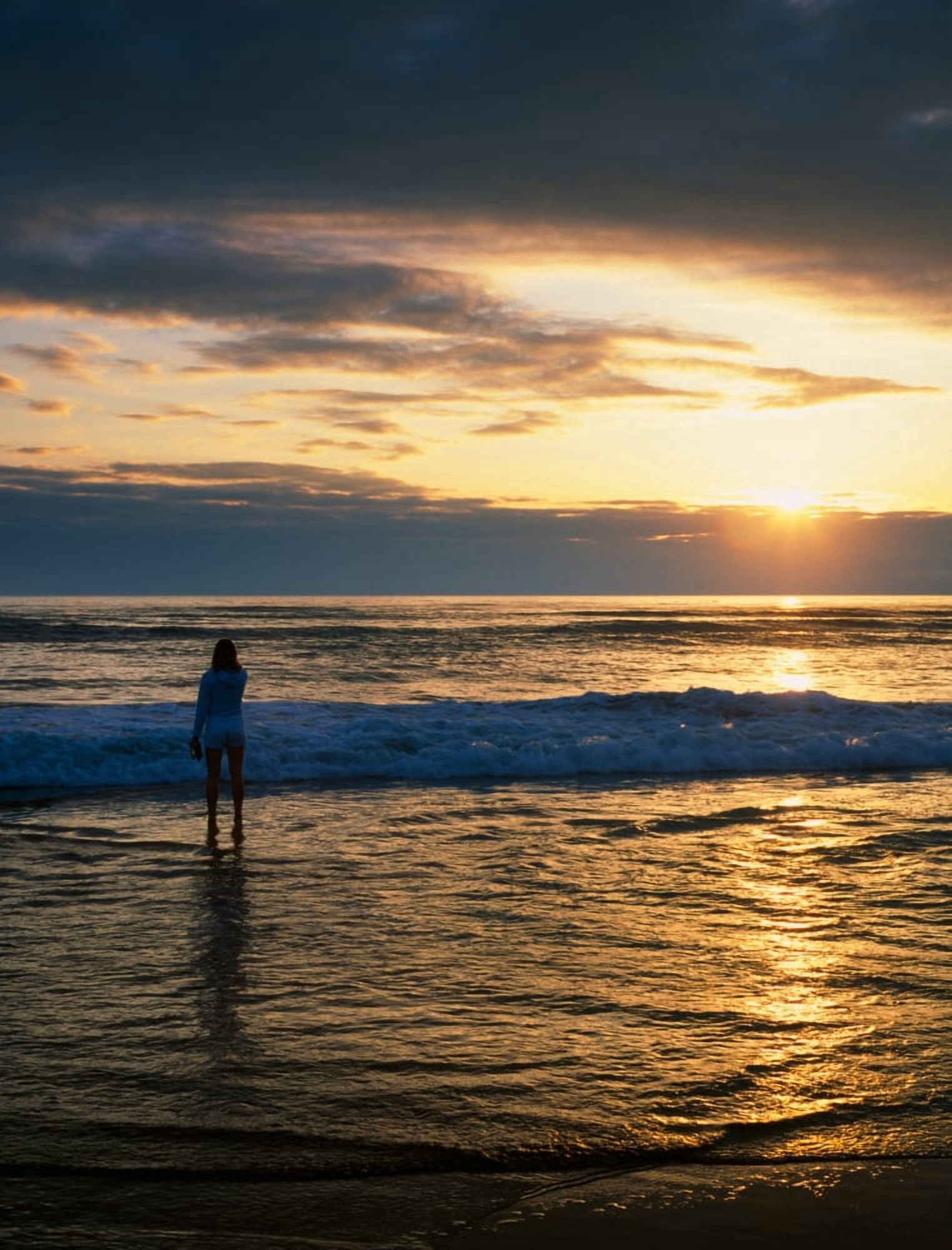 Rear View Of Woman On Beach Looking Toward Horizon Canvas Art - Panoramic Images (28 x 22)