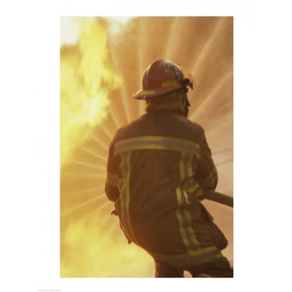 Rear View of A Firefighter Extinguishing A Fire Poster Print, 18 x 24