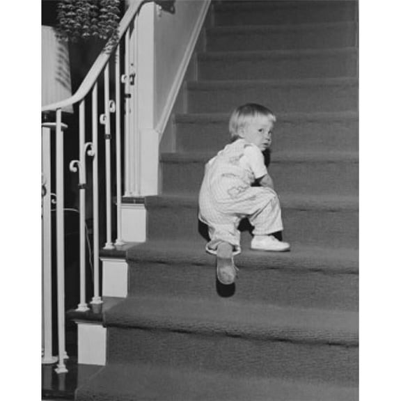 Rear View of a Baby Girl Climbing Up a Staircase Poster Print