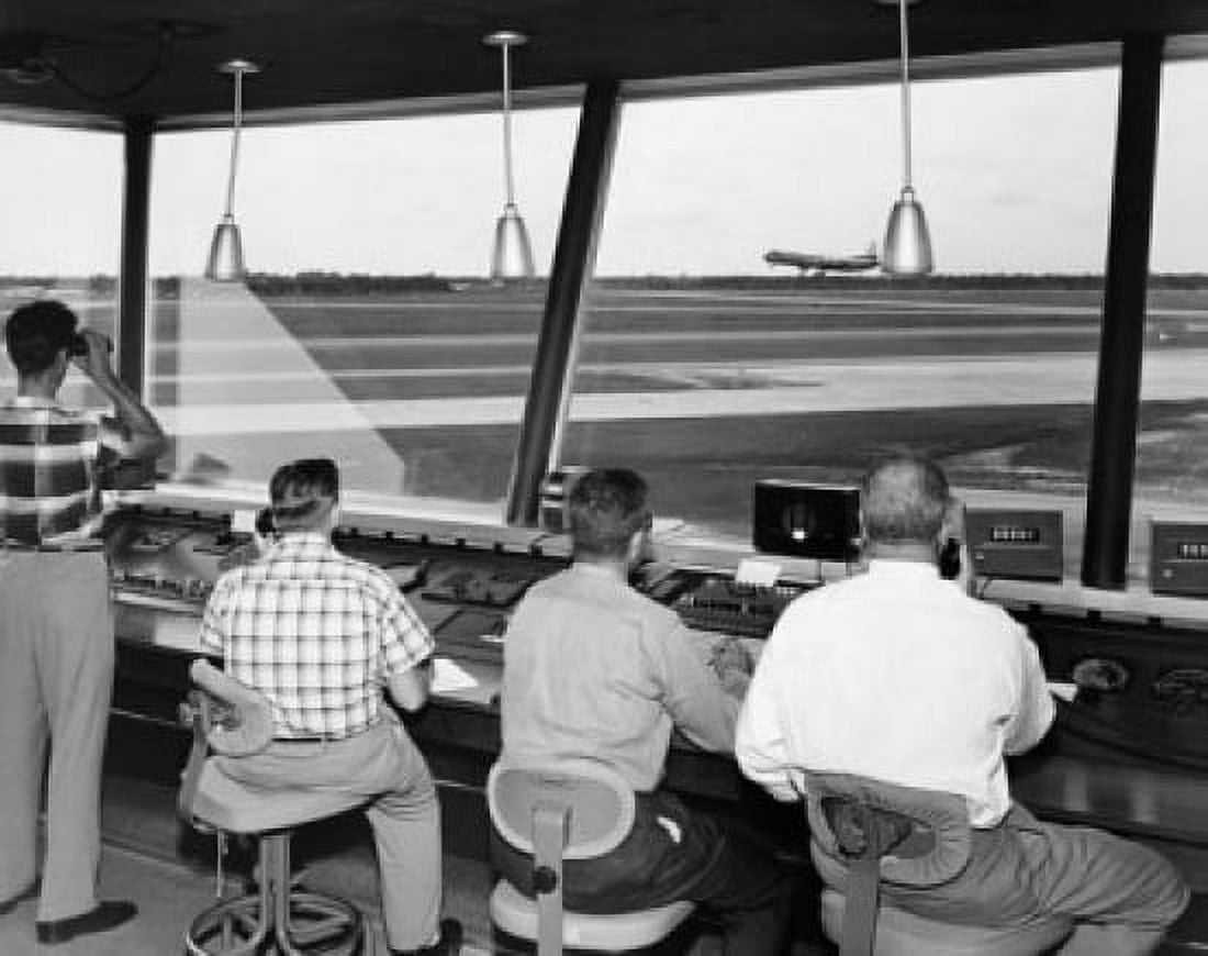 Rear view of four technicians working in an air traffic control tower Sarasota-Bradenton International Airport Sarasota Florida USA Canvas Art - (18 x 24)