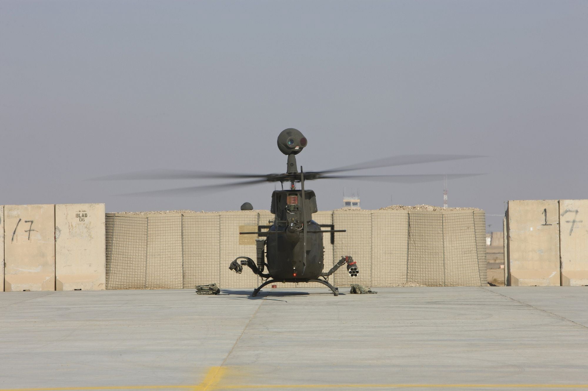 Rear view of a OH-58D Kiowa Warrior at Camp Speicher Iraq Canvas Art - Terry MooreStocktrek Images (18 x 12)