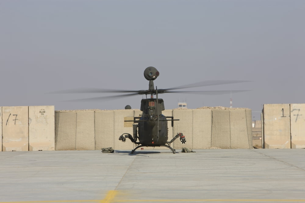 Rear view of a OH-58D Kiowa Warrior at Camp Speicher Iraq Canvas Art - Terry MooreStocktrek Images (35 x 23)