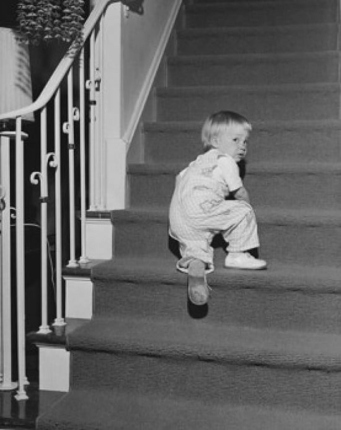 Rear view of a baby girl climbing up a staircase Canvas Art - (18 x 24)