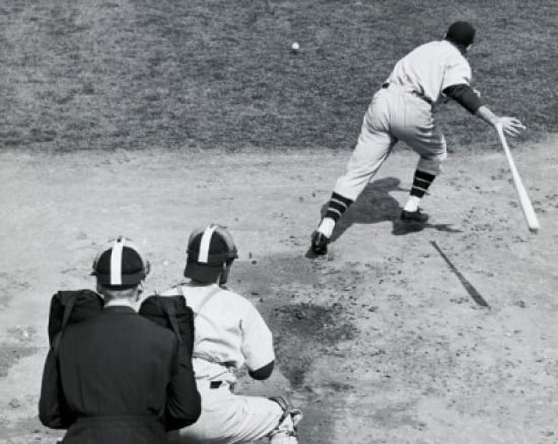 Rear view of a batter running after hitting the ball with a catcher and an umpire standing behind him Canvas Art - (18 x 24)