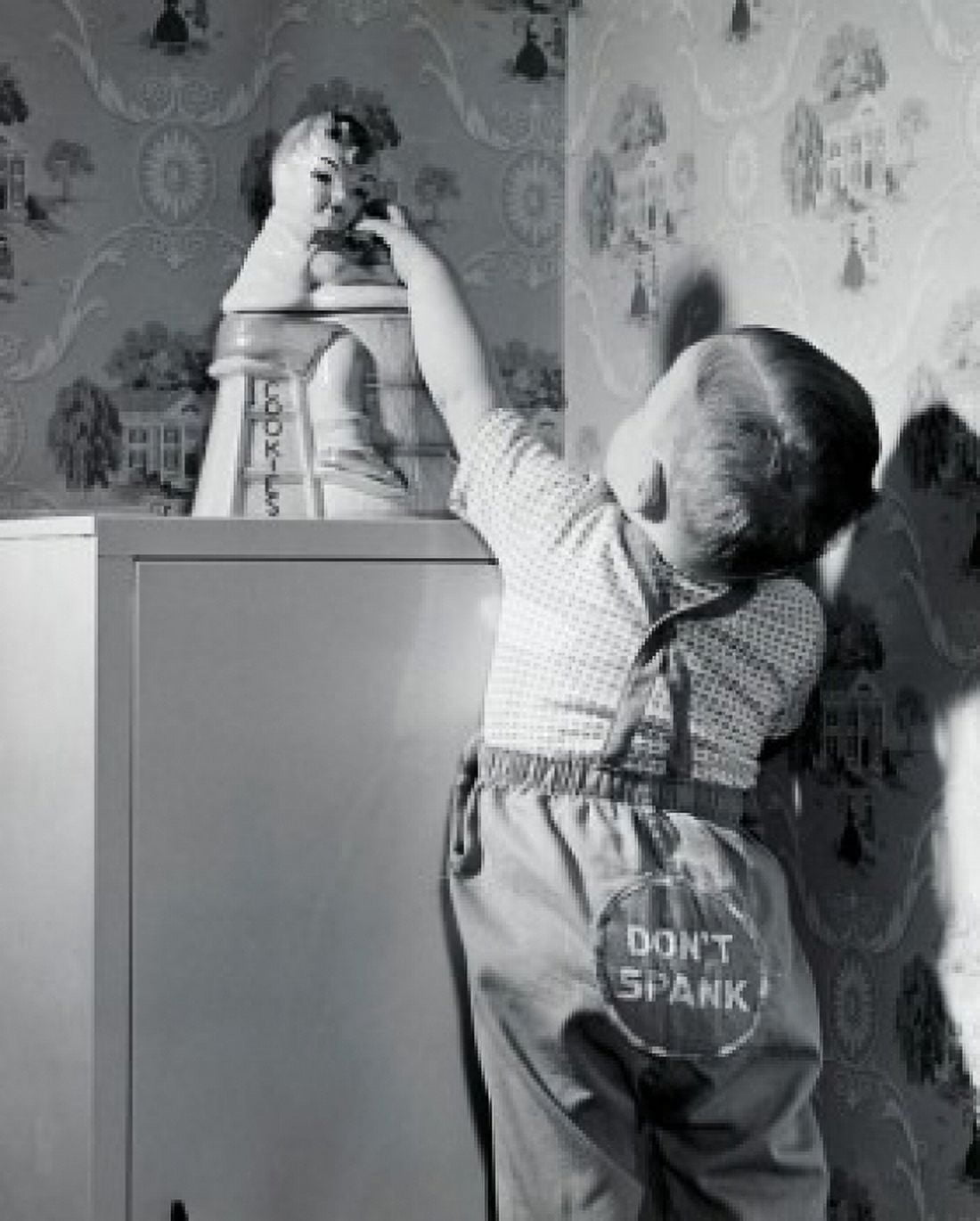 Rear view of a boy reaching for cookies Canvas Art - (24 x 36)