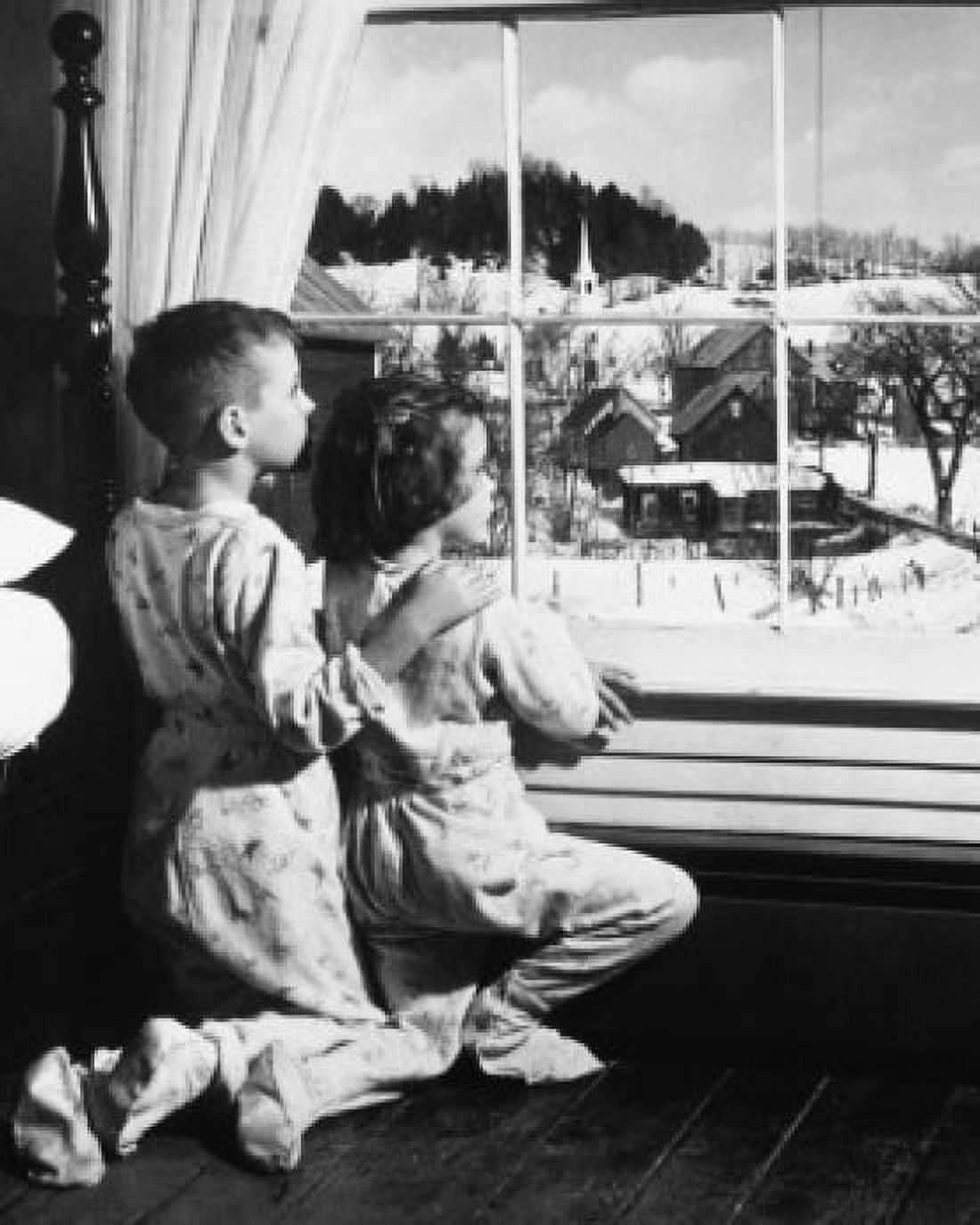 Rear view of a brother and his sister looking through a window Canvas Art - (24 x 36)