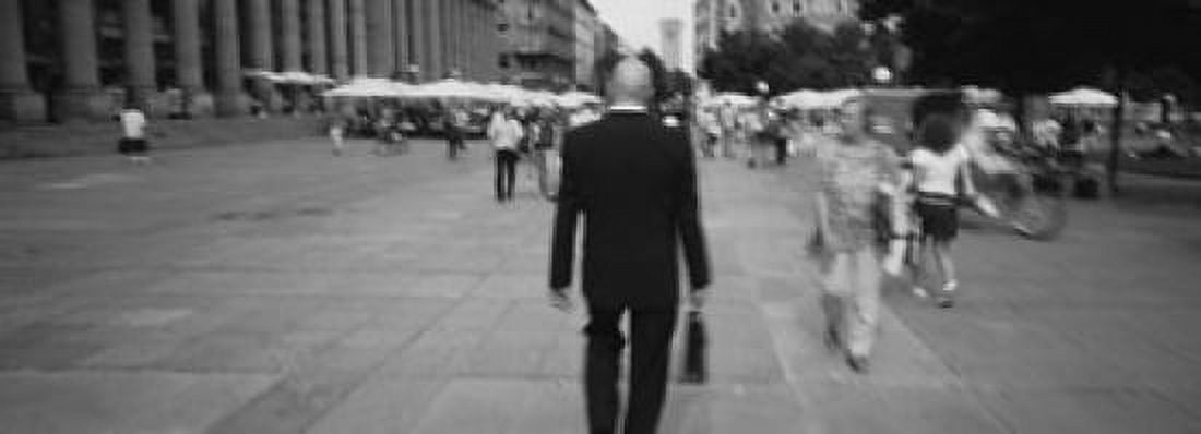 Rear view of a businessman walking on the street Stuttgart Germany Canvas Art - Panoramic Images (18 x 7)