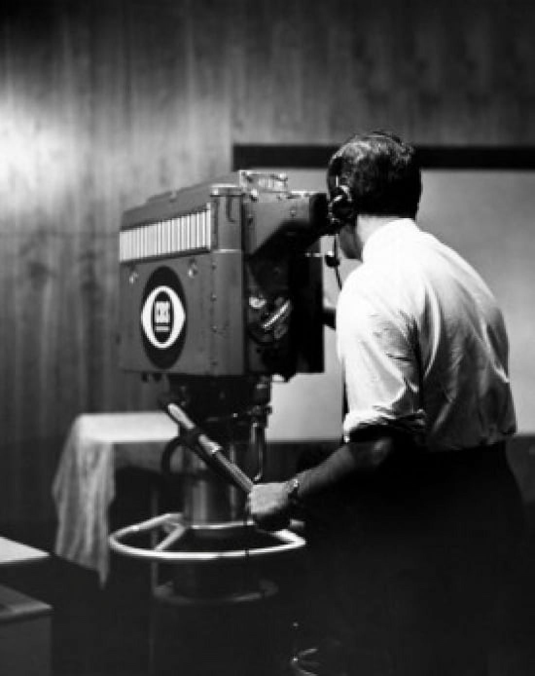 Rear view of a cameraman operating a television camera Canvas Art - (18 x 24)
