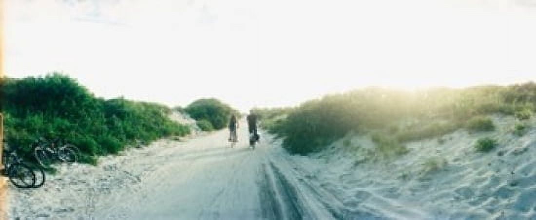 Rear view of a couple cycling along a beach trail Fort Tilden Queens New York City New York State USA Canvas Art - Panoramic Images (30 x 13)