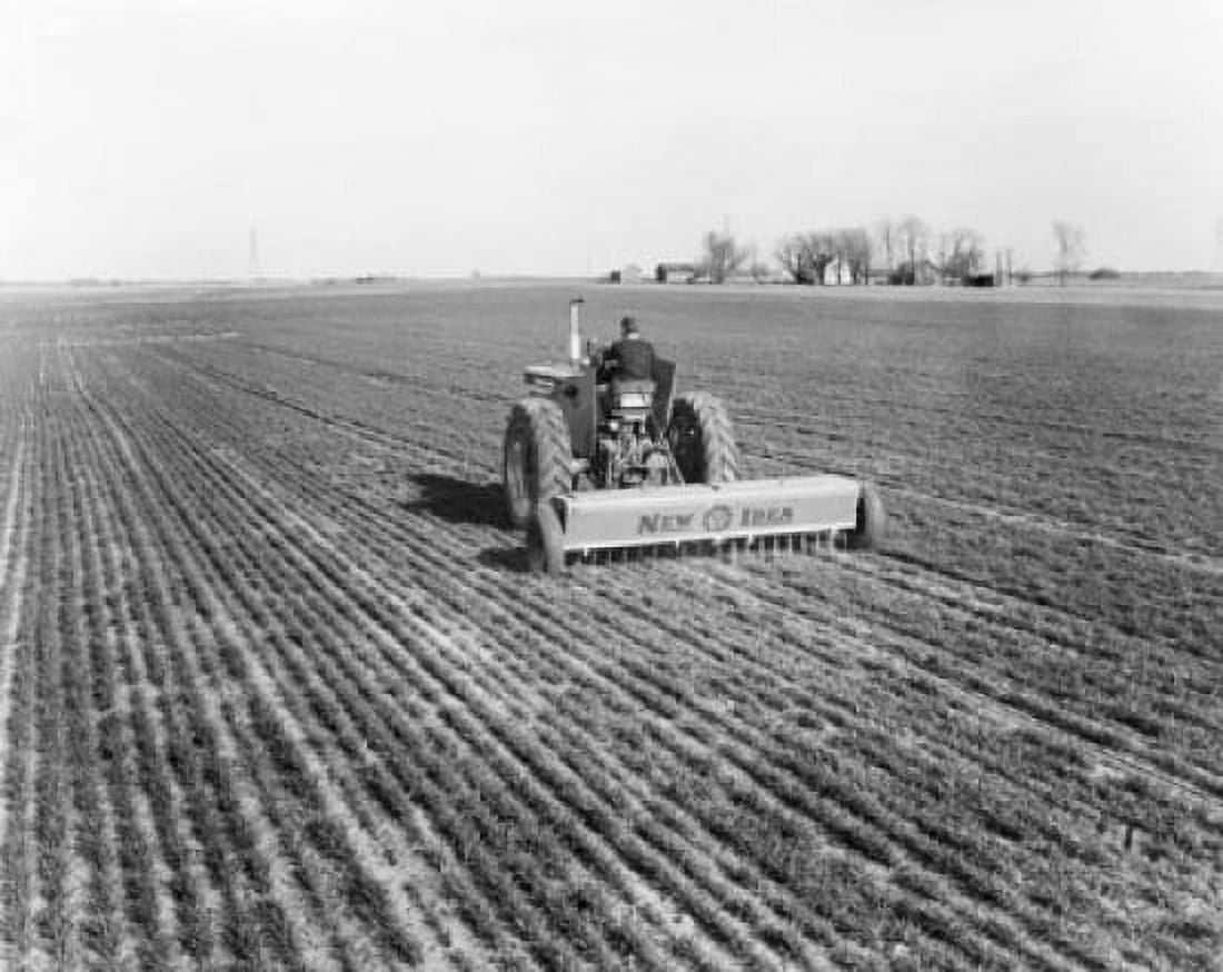 Rear view of a farmer plowing a field with a tractor Canvas Art - (18 x 24)