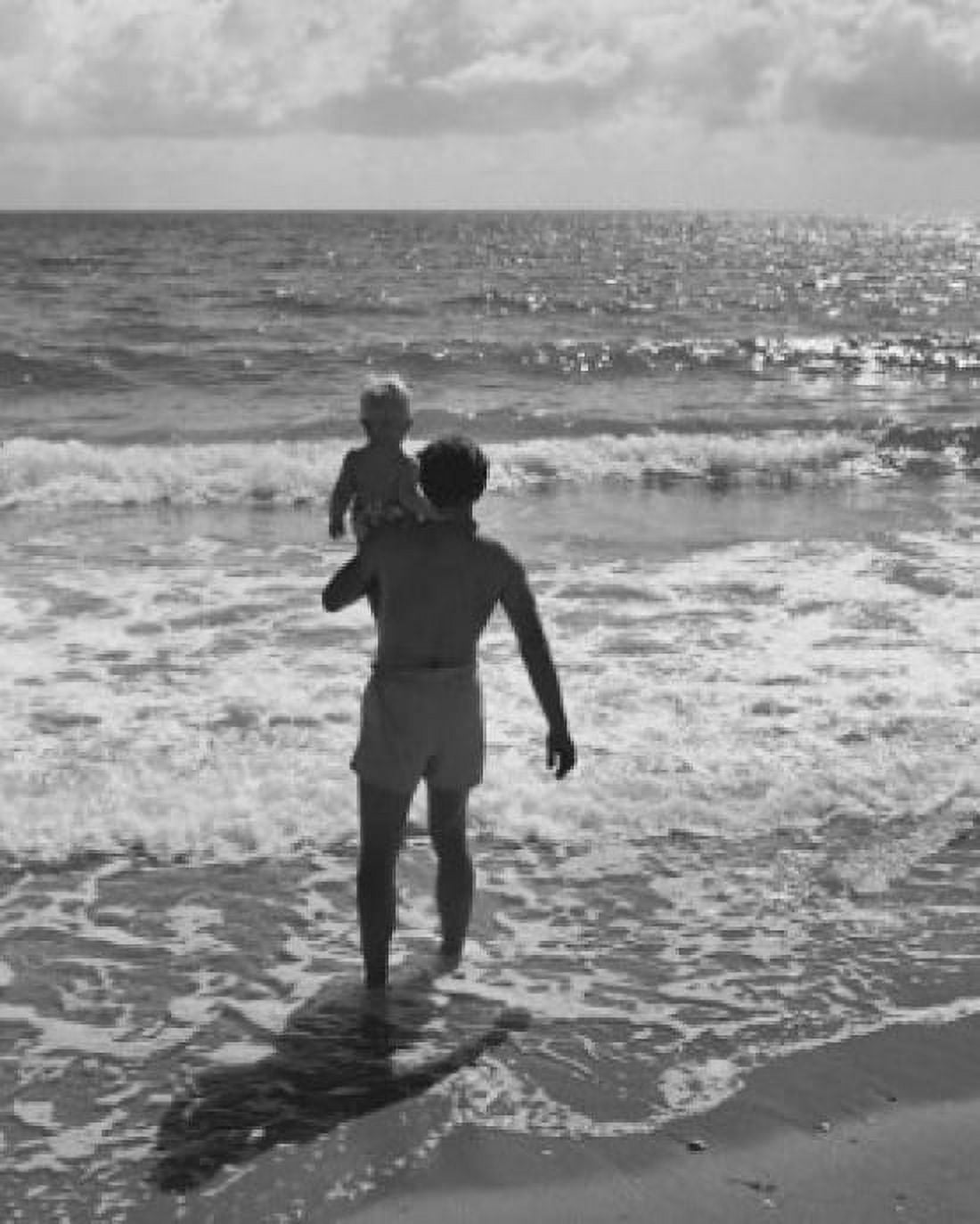 Rear view of a father carrying his son on the beach Canvas Art - (18 x 24)