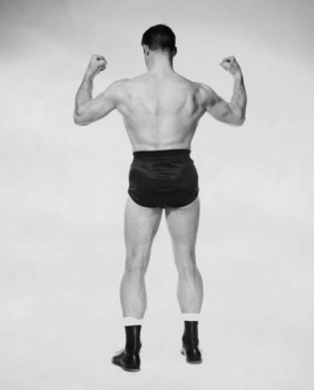 Rear view of a male body builder flexing his muscles Canvas Art - (18 x 24)