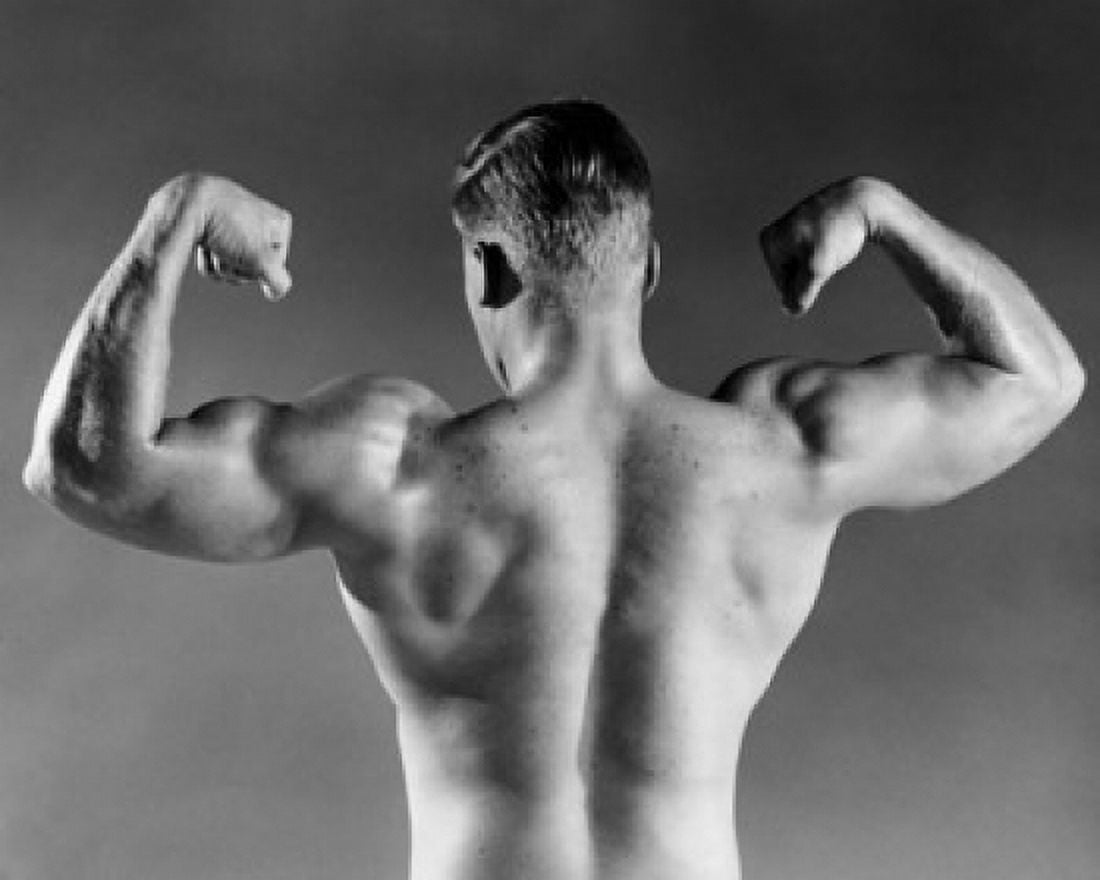 Rear view of a male body builder flexing his muscles Canvas Art - (18 x 24)