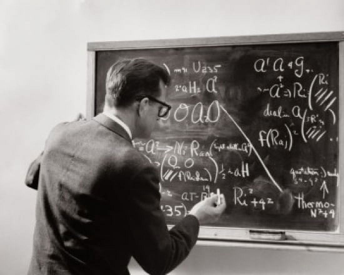 Rear view of a male teacher writing with chalk on a blackboard Canvas Art - (24 x 36)