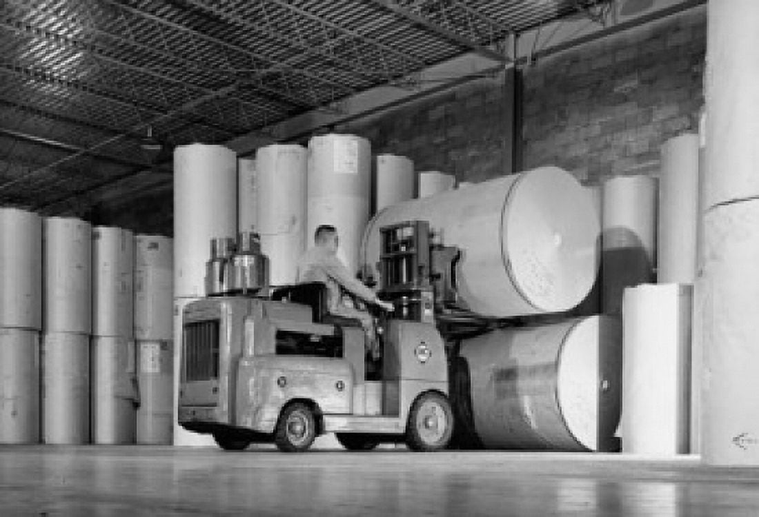 Rear view of a man driving a forklift in a warehouse Canvas Art - (18 x 24)