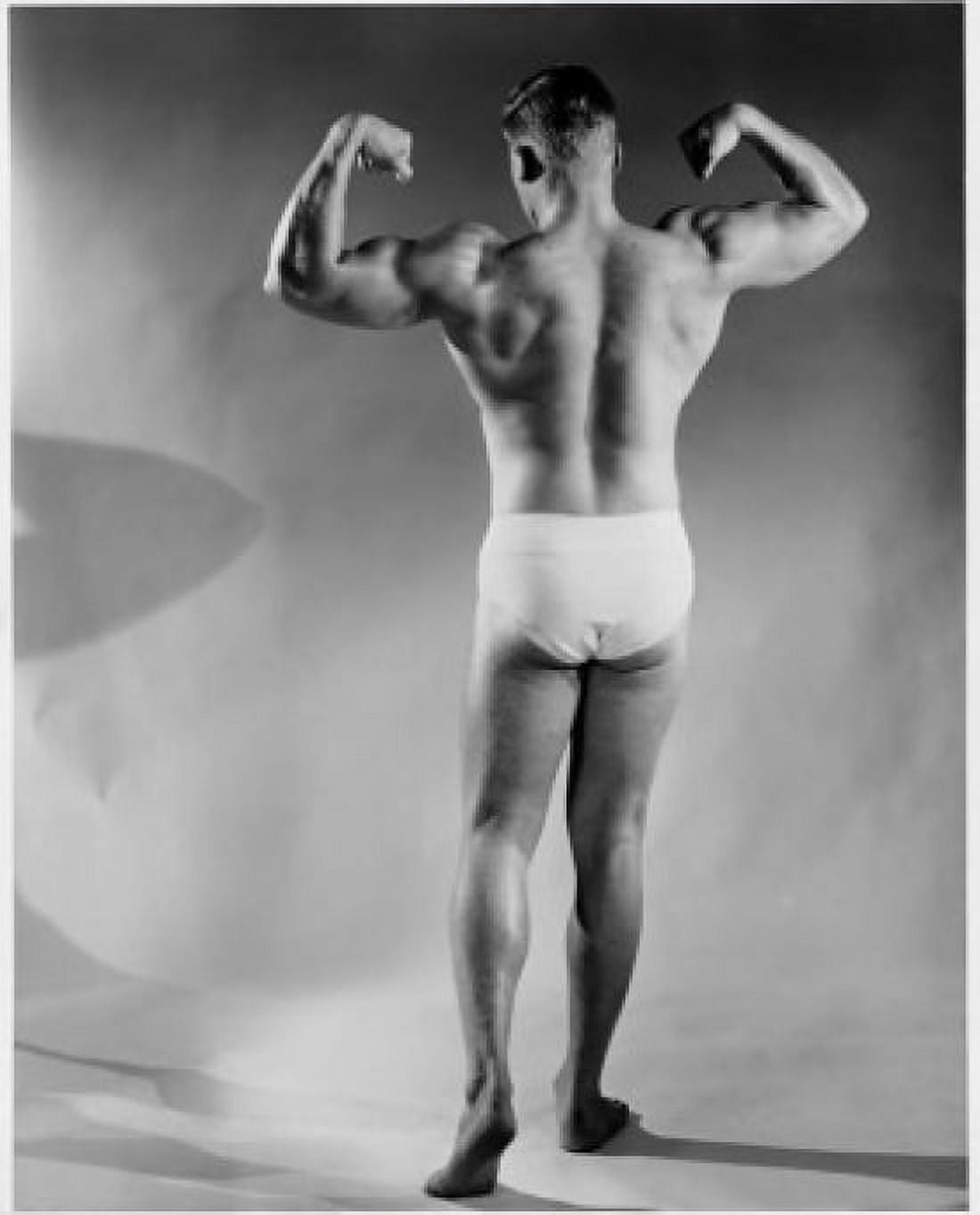 Rear view of a man flexing his muscles Canvas Art - (24 x 36)