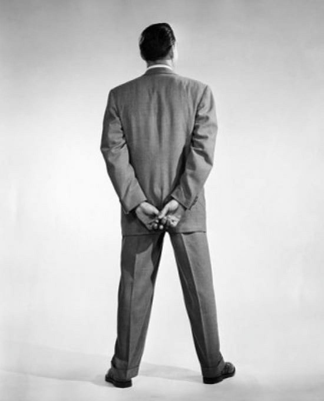 Rear view of a man standing with his hands behind his back Canvas Art - (24 x 36)